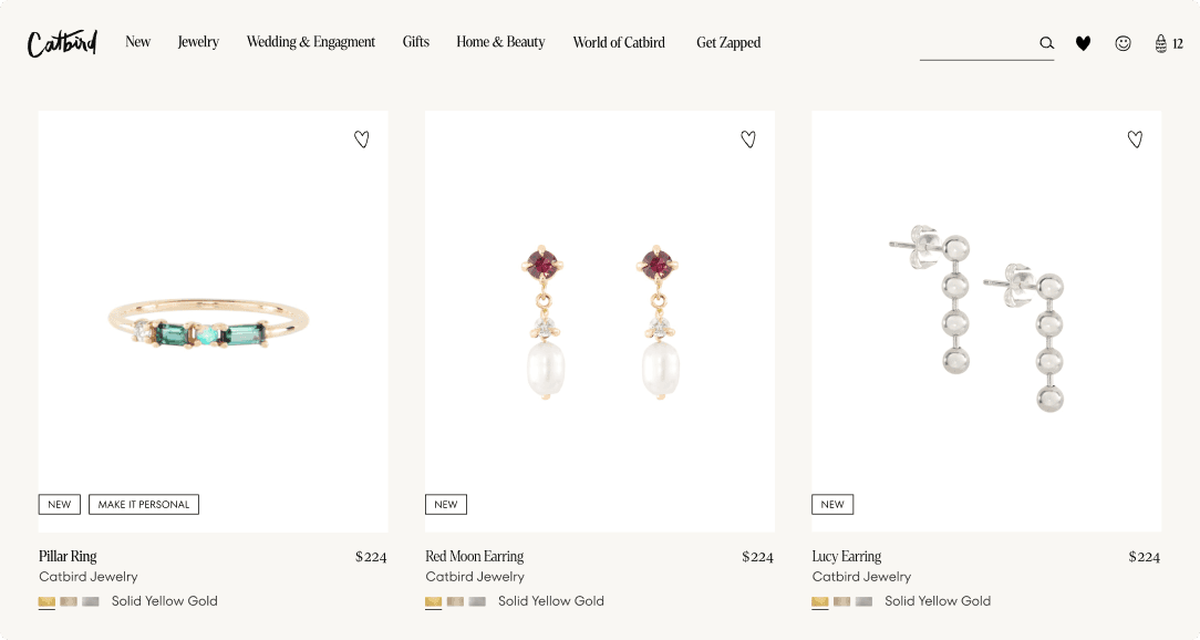 Catbird NYC product listing with the Pillar Ring, Red Moon Earring, and Lucy Earring in 14k gold on a clean white background