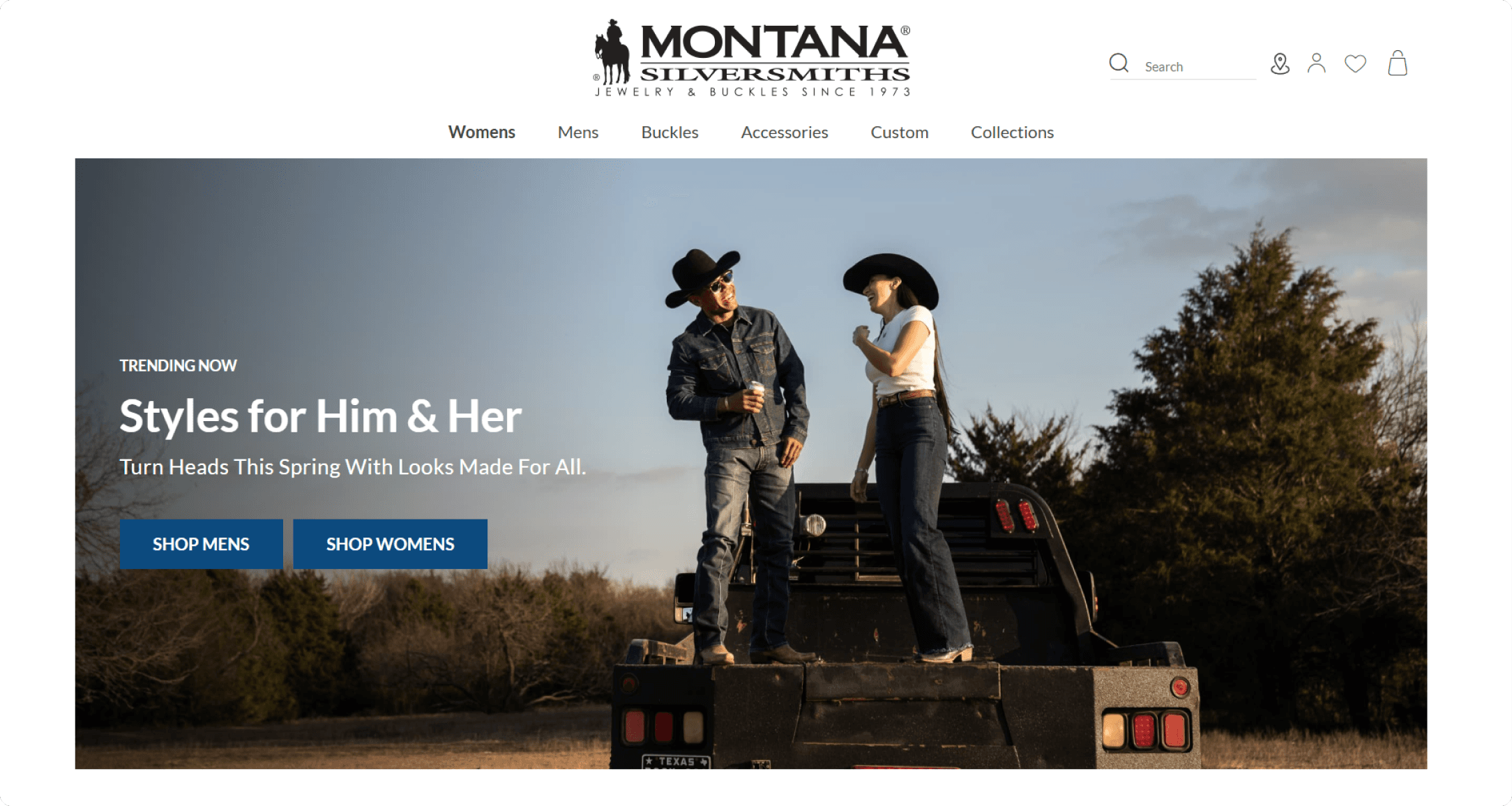 Montana Silversmiths homepage hero with a couple in western wear on a truck flatbed, promoting Styles for Him and Her